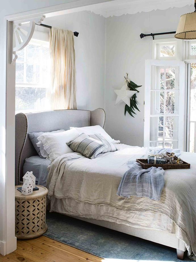 Don't forget to [decorate the spare bedroom](https://www.homestolove.com.au/spare-room-decorating-tips-8865|target="_blank") for guests! Take inspiration from [Arafel Park guest house](https://www.homestolove.com.au/bowral-airbnb-arafel-park-13967|target="_blank") renovated by Alischa Hermann, founder of [Bespoke Letterpress](https://bespokepress.com.au/|target="_blank"|rel="nofollow"). A fabric star and tea-light holders add a festive touch, while luxurious linen sets the scene for a good night's sleep.