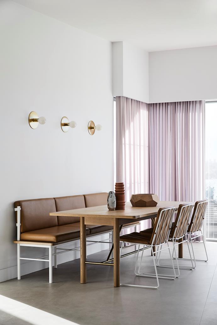 The family use the second, casual banquette area to do homework, socialise and enjoy meals together. The built-in banquette was custom-made in easy-to-wipe-clean leather by [Tuckbox Design](https://www.tuckbox.com.au/|target="_blank"|rel="nofollow").