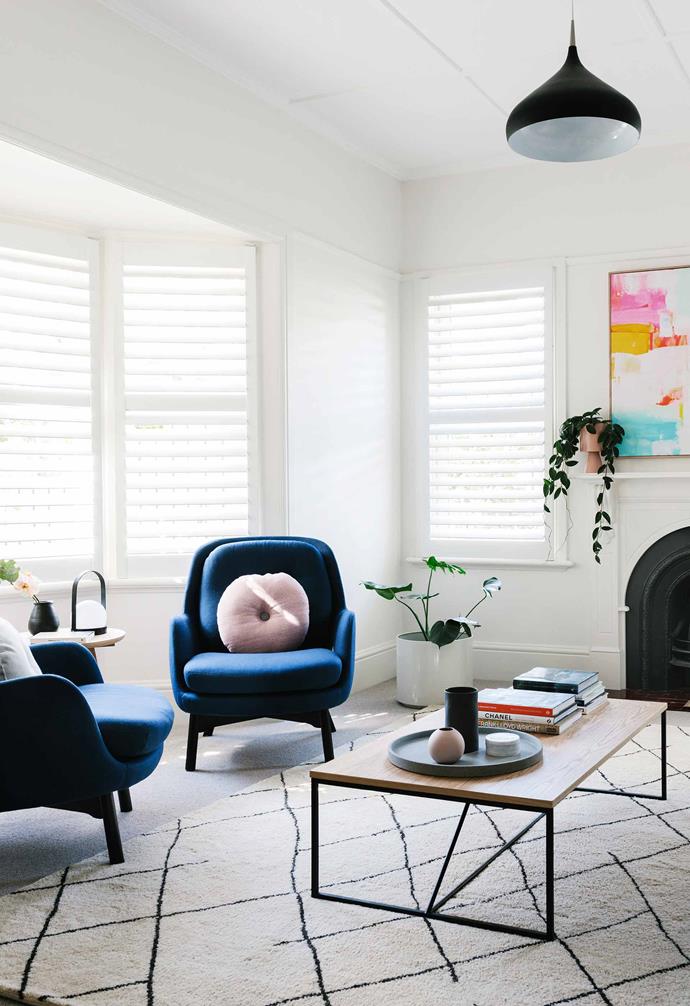 **Formal living area** Navy armchairs from [MRD Home](https://mrdhome.com.au/|target="_blank"|rel="nofollow") add a pop of colour. Artwork: Kirsten Jackson. Coffee table, [Globewest](https://www.globewest.com.au/|target="_blank"|rel="nofollow").