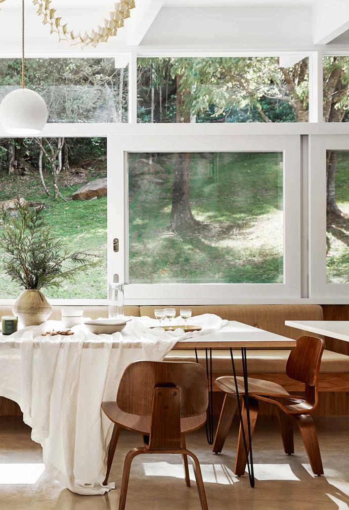 **Dining area** Generous windows in the dining area make the most of stunning natural views. Dinner plates in Olive, recycled clay miso and pasta bowls, and Jahi brass candlesticks, all [Shackpalace Rituals](https://shackpalacerituals.com/|target="_blank"|rel="nofollow"). Uscha circular ceramic vessel and brass tray, [Newrybar Merchants](http://www.newrybarmerchants.com/|target="_blank"|rel="nofollow").She Lights 'Inga' pendant, [Temple & Webster](https://www.templeandwebster.com.au/|target="_blank"|rel="nofollow"). Linen tablecloth, [I Love Linen](https://www.ilovelinen.com.au/|target="_blank"|rel="nofollow").