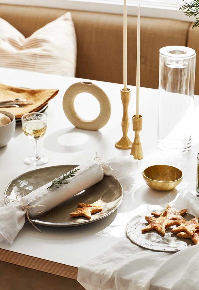**Table detail** As the family hangs out at the beach for most of Christmas day, celebrations at home are elegant but simple. Ceramic plates in Olive, Osko aged-silver fork set, Jahi brass candlesticks and brass bowl, [Shackpalace Rituals](https://shackpalacerituals.com/|target="_blank"|rel="nofollow"). White linen napkin, [I Love Linen](https://www.ilovelinen.com.au/|target="_blank"|rel="nofollow"). White twine, [Officeworks](https://www.officeworks.com.au/|target="_blank"|rel="nofollow"). Conifer sprig, [Braer](https://braerstudio.com/|target="_blank"|rel="nofollow"). Uscha circular vase and candles, [Newrybar Merchants](http://www.newrybarmerchants.com/|target="_blank"|rel="nofollow"). Glass cylinder vase with tealight holder, [The Party Parlour](https://thepartyparlour.com.au/|target="_blank"|rel="nofollow").