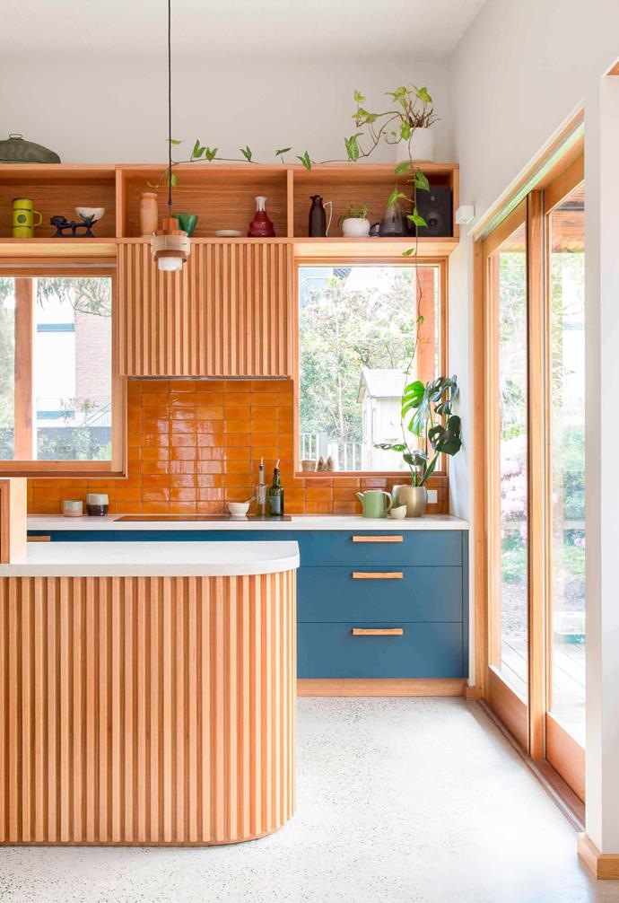 The heart of this [eco-friendly Melbourne bungalow](https://www.homestolove.com.au/eco-friendly-melbourne-bungalow-17260|target="_blank") features a warm palette of timber paired with white, with statement blue cabinetry adding a pop of colour. 