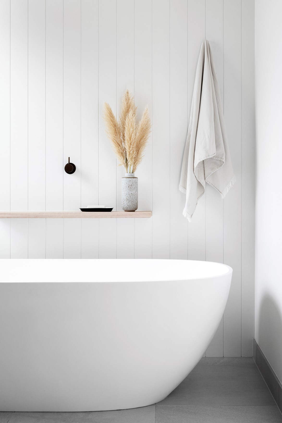 How to make white walls look good in the bathroom depends on working with, not against architectural details as seen in this [Scandinavian style beach house](https://www.homestolove.com.au/scandinavian-style-beach-house-20995|target="_blank").