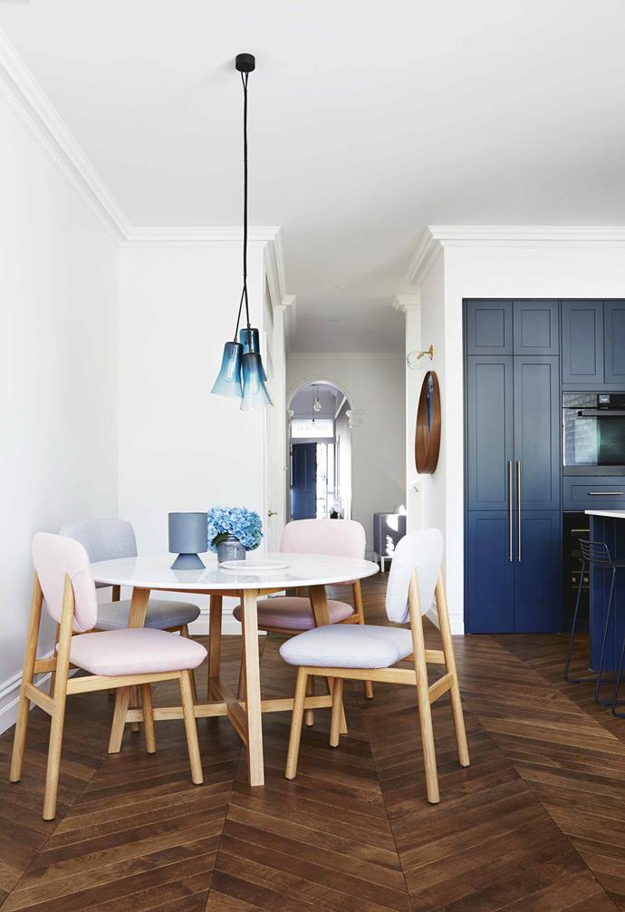 With the bulk of the open-plan living room in this [renovated Edwardian semi](https://www.homestolove.com.au/modern-edwardian-semi-renovation-18524|target="_blank") taken up by a generous living space and kitchen, this compact dining nook comprises of a circular marble-topped table that's perfect for small gatherings. A circular table is the perfect choice for a high-traffic zone.
