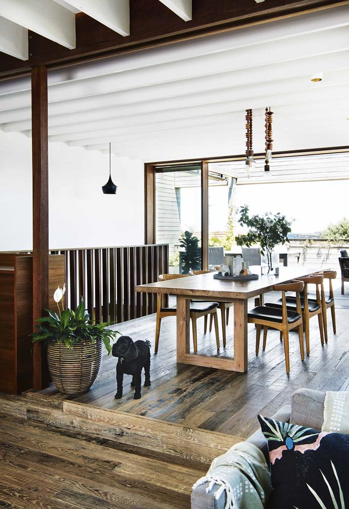 Timber tones are a key feature throughout this [weatherboard home in Freshwater](https://www.homestolove.com.au/eco-friendly-weatherboard-house-freshwater-17440|target="_blank") and this dining room space is no exception. The key to pairing timber furniture with timber floors is to be mindful of the tones you choose.