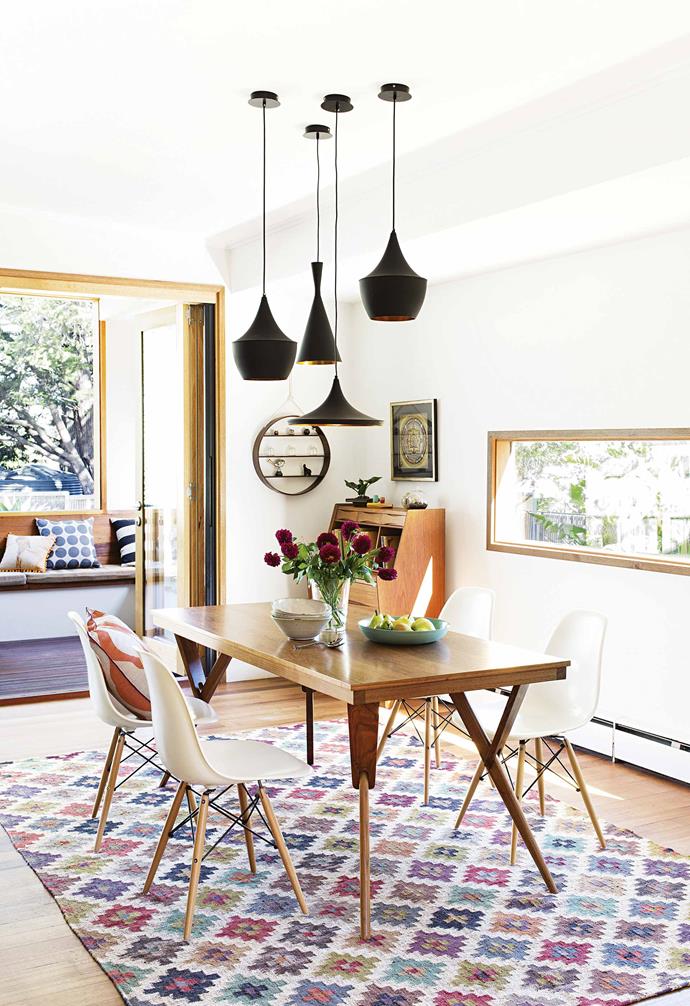 The design of this [timber-clad sustainable home in Melbourne](https://www.homestolove.com.au/timber-clad-sustainable-house-17545|target="_blank") centred on creating an eco-friendly home that was perfect for the whole family. A vibrant patterned rug creates a clear dining zone in the home while adding a playful sense of personality to the space. 