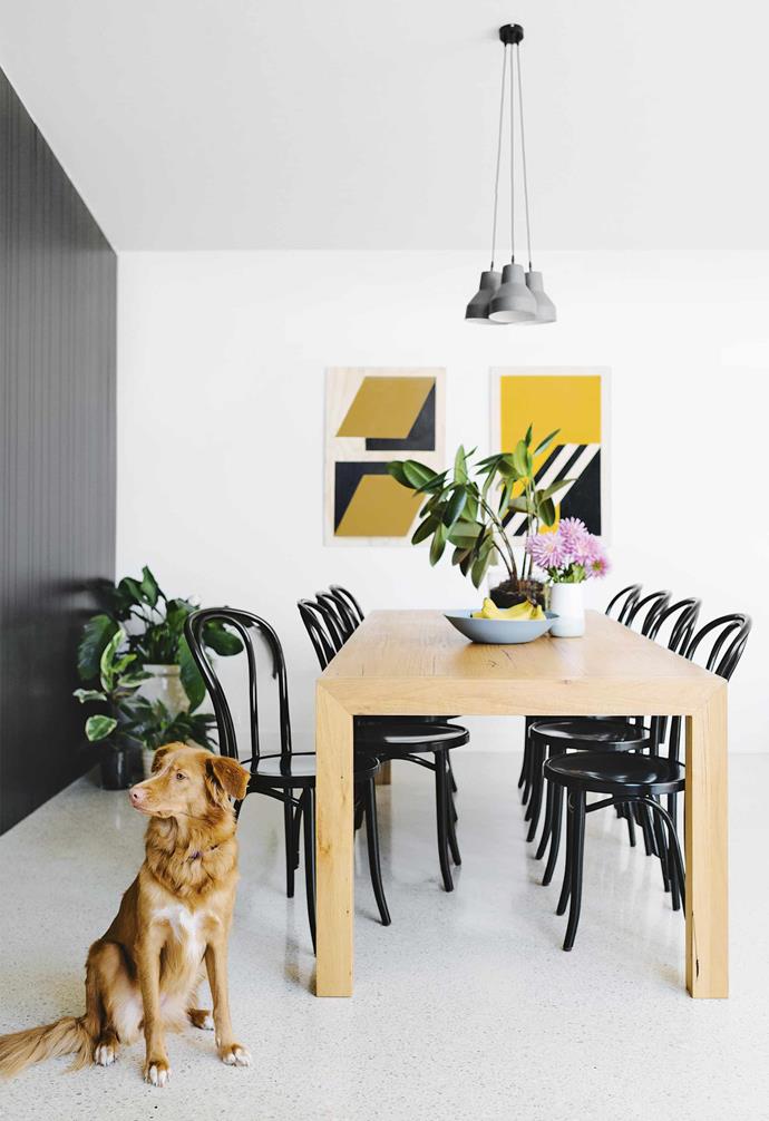 "When we knew we were going to come home, we engaged an architect so that we could get the renovation started as soon as we got back," explains Will. The pair did their research, interviewed a number of architects over the phone and via Skype, and finally teamed up with [Clare Cousins](https://clarecousins.com.au/|target="_blank"|rel="nofollow").<BR><BR>**Dining** This pair of bold, geometric artworks by [Marcus Hollands](http://marcushollands.com/|target="_blank"|rel="nofollow") elevates the tones of the timeless dining setting in this modern Melbourne home.