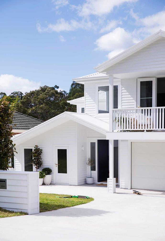 After planning their dream renovation for over 12 months, this [Hamptons-style Sydney home](https://www.homestolove.com.au/all-white-hamptons-style-home-21036|target="_blank") was transformed into the perfect family home. The crisp exterior features weatherboard cladding in K2 by [Porter's Paints](https://www.porterspaints.com/|target="_blank") which give the home a dramatic and fresh look on the streetscape.