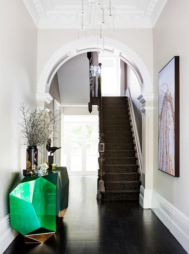 The devil is in the detail for interior designer Brendan Wong who finessed this [1890s home](https://www.homestolove.com.au/grand-victorian-terrace-updated-with-contemporary-furnishings-21112|target="_blank") into a modern gem. "They wanted modern elegance with warmth, but not too uptight," says Brendan. A statement-making emerald green lacquered and bronze sideboard in the wide entrance hallway creates a strong first impression.