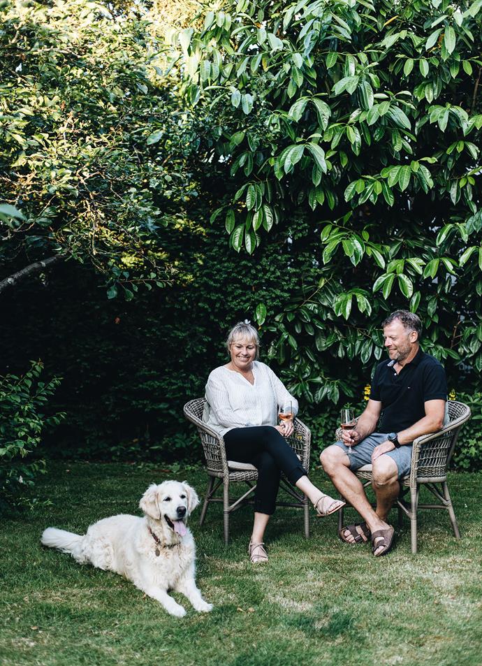 Louise with her husband Jesper and their 11-year-old golden retriever Molly.