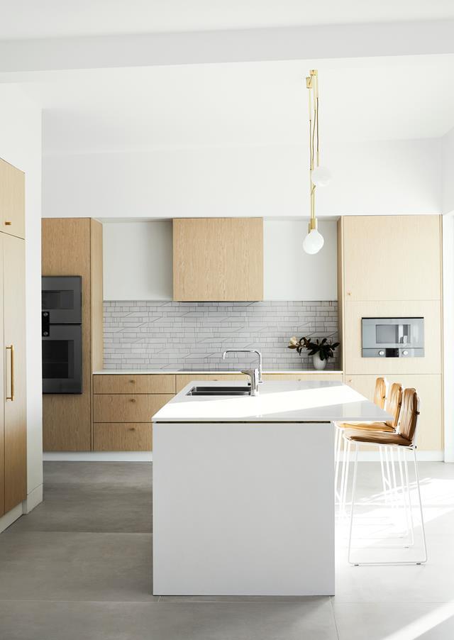 Homeowners Anthony and Angela love the effortless flow that Sonja Kritzler Design created in their new [Scandi-style kitchen](https://www.homestolove.com.au/modern-scandi-home-20874|target="_blank"), which features easy-clean surfaces, instant hot water and lots of bench space.