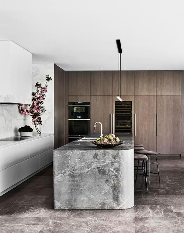 "The design of this project does not deliver a themed look. Instead, it delivers a unique custom approach to [kitchen design](https://www.homestolove.com.au/9-luxury-kitchen-designs-5182|target="_blank") incorporating a timeless aspect with the use of authentic, visually appealing materials and product selection," explains designer Miriam Fanning.