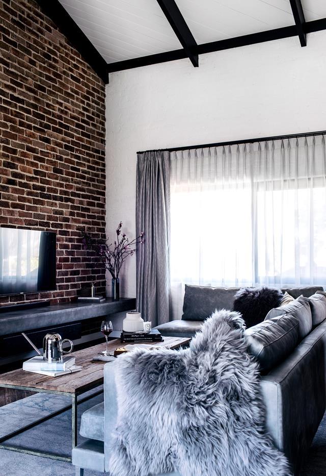 Rustic modern was the inspiration for this charming [Sydney home](https://www.homestolove.com.au/modern-farmhouse-18904|target="_blank") that has been renovated for a pair of avid entertainers. A custom leather lounge with Project 82 provides the perfect lounging space.