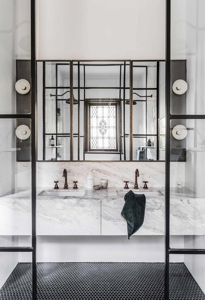 Trapeze lights from Criteria Collection create a glamourous look above the vanity in the bathroom of interior designer [Jillian Dinkel's Federation home](https://www.homestolove.com.au/jillian-dinkel-home-21167|target="_blank"). 