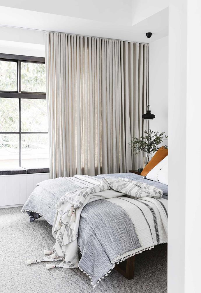 [A Federation cottage](https://www.homestolove.com.au/federation-cottage-queens-park-18311|target="_blank") is now the perfect family home. The ceiling-height drapes in this bedroom create a cosy, cocooned feeling.