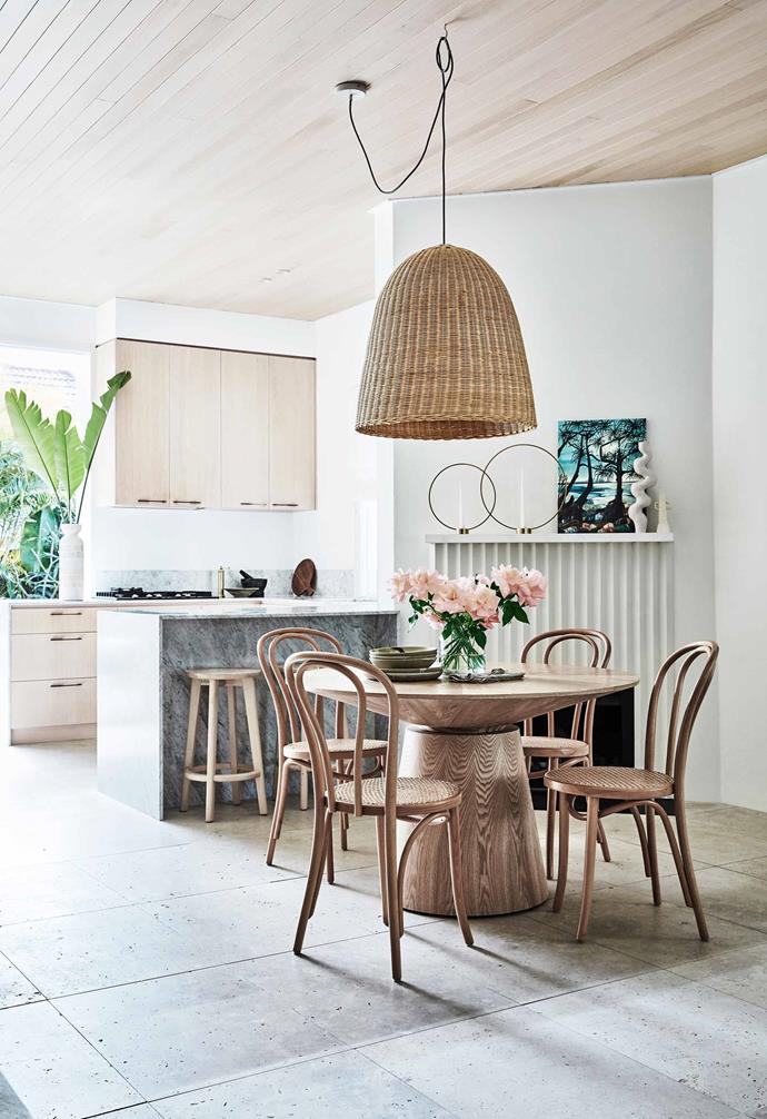 A gorgeous textural palette creates a sense of movement and flow in the open-plan kitchen and dining area of interior designer Kristy McGregor's [dreamy Bondi beach house](https://www.homestolove.com.au/kristy-mcgregor-house-21306|target="_blank"), which she renovated alongside her husband James.