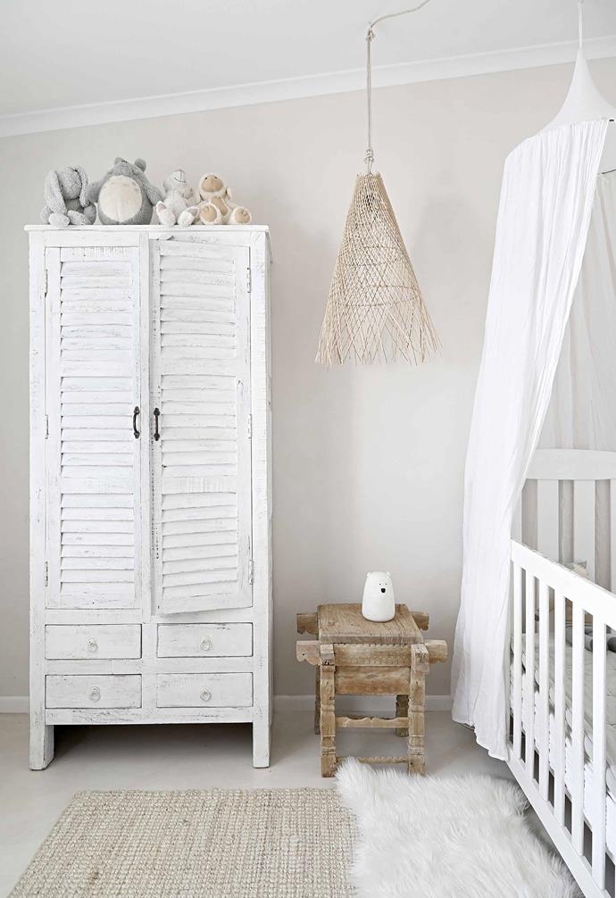 **Reid's room** An old cabinet painted white and cot from Gumtree are elevated by a bed canopy by [Numero 74](https://www.numero74.com/|target="_blank"|rel="nofollow"). Side table and pendant light, [Alabaster Trader](https://www.alabastertrader.com/|target="_blank"|rel="nofollow"). Jute rug, [AU Rugs](https://www.aurugs.com/|target="_blank"|rel="nofollow").