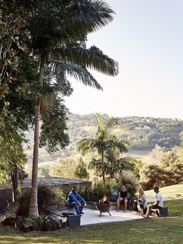 Originally part of a 120-hectare dairy farm that was later subdivided, [this property](https://www.homestolove.com.au/river-cottage-australia-20311|target="_blank") backs onto Bilambil Creek. The family spends a lot of time outside, making good use of a fire pit.