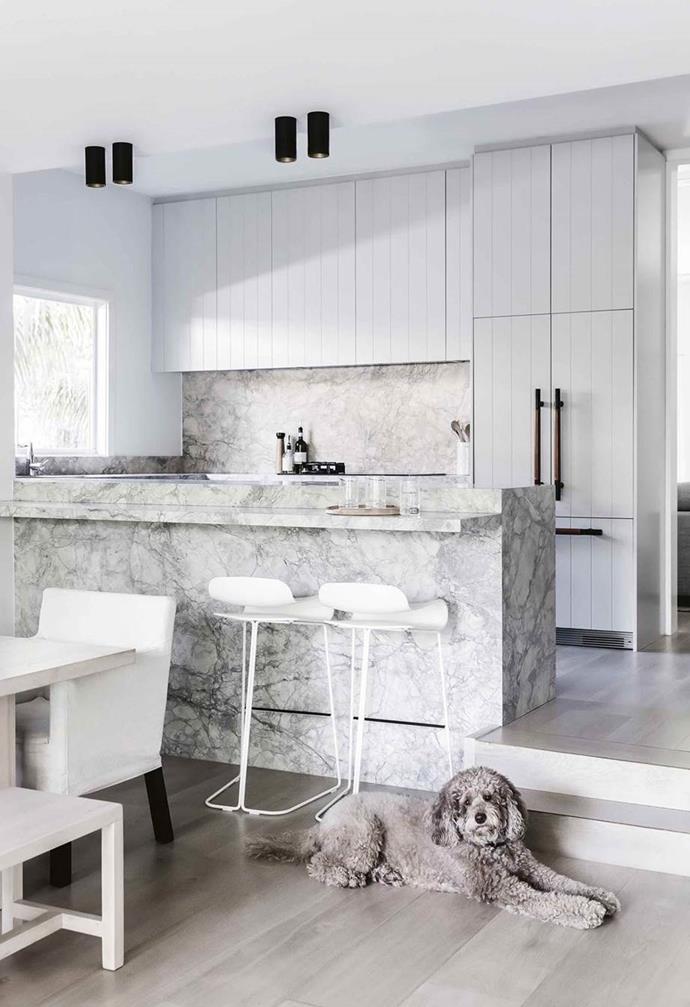 Black, minimal Delta Light 'Ultra SD' downlights from Inlite complete a streamlined zone, especially given the close proximity of the dining space and the kitchen in a [renovated weatherboard home](https://www.homestolove.com.au/bellamumma-nikki-yazxhi-home-tour-16880|target="_blank").