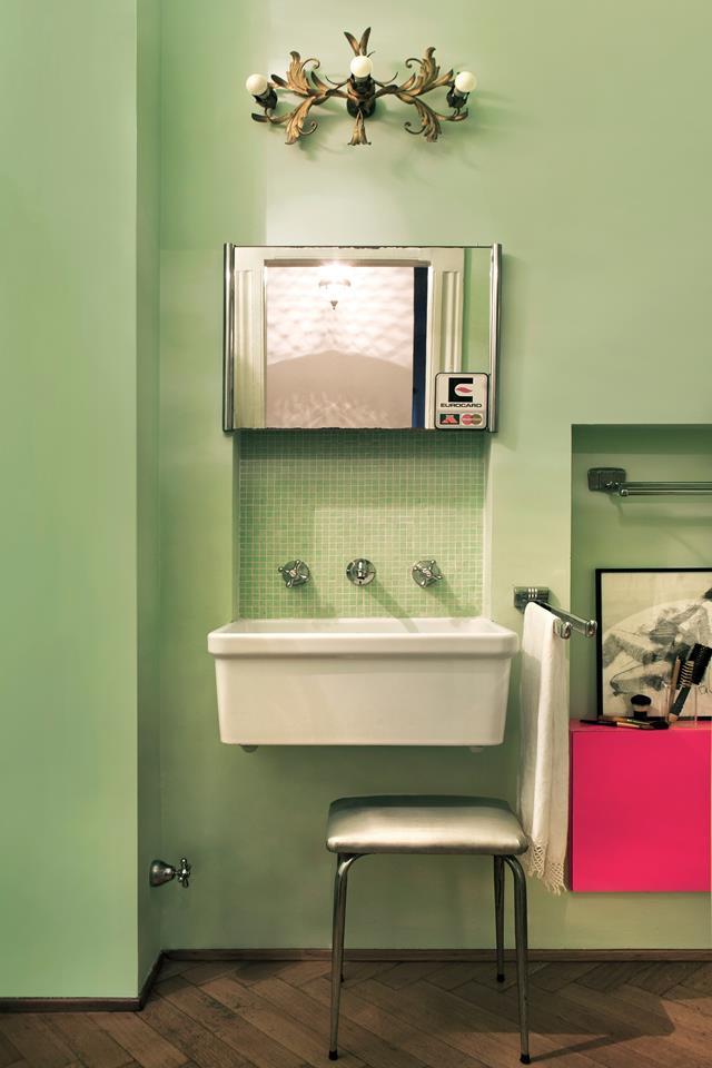 A lime green bathroom suits the colourful hues and original features of a [jewellery designer's Art-Deco apartment in Milan](https://www.homestolove.com.au/a-colourful-art-deco-apartment-in-milan-4635|target="_blank") which has retained its vintage vibe with fittings from the 1930s.