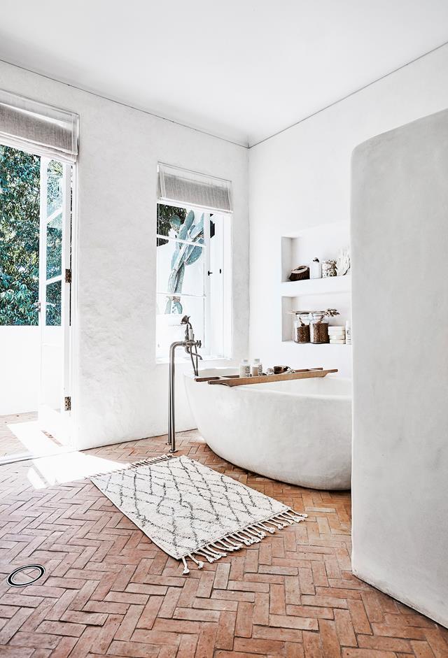 Stylist Romi Weinberg turned a formerly mustard home into [this modern, rustic, relaxing abode](https://www.homestolove.com.au/modern-rustic-interior-design-21024|target="_blank"), with the perfect freestanding bath to match.