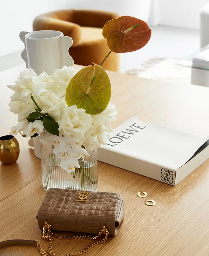 Take your coffee table styling to the next level by adding some stylish books.