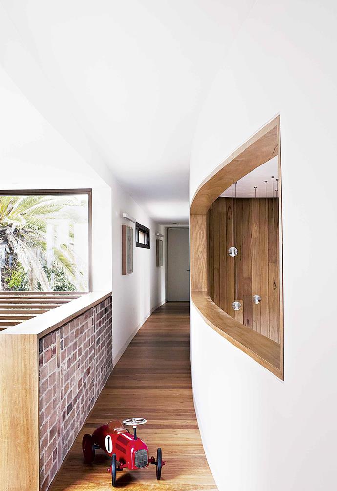 **And the bedroom upstairs?** <br><br>Lee: I wanted you to go up the timber stairs and feel a warmth and homeliness. The [master bedroom](https://www.homestolove.com.au/modern-bedroom-ideas-18706|target="_blank") with its bath and views is a real feature – the owners wanted to feel like they were staying in a high-end hotel, but still have a sense of place and connection. <br><br>**Alex**: Bedrooms shouldn't be overpowering in terms of materials. With the bath, I like that idea of time to contemplate and have that moment to experience the view. It's a parents' retreat.