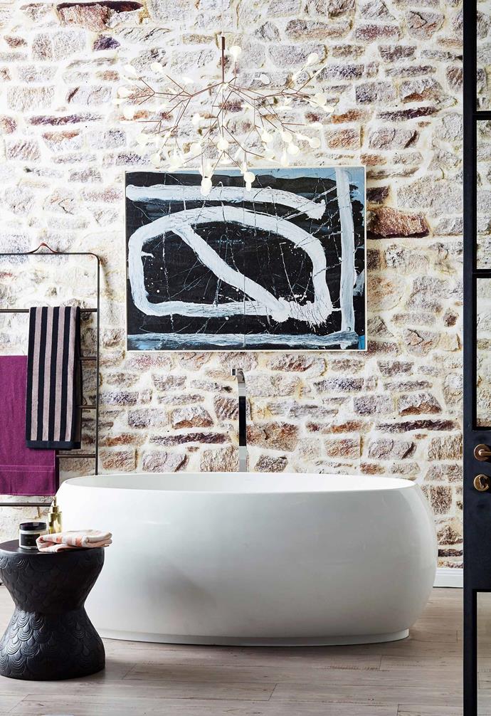 Parisi's 'Senso' Stonetec design softens this bathroom's hard surfaces.
