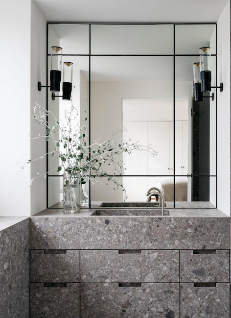 A downsizing couple's dreams of a peaceful life divined the renovation of this simply beautiful [apartment](https://www.homestolove.com.au/harbourside-apartment-with-minimalist-interior-21376|target="_blank"). The honed Ceppo limestone vanity with an integrated sink is the centrepiece of the ensuite.