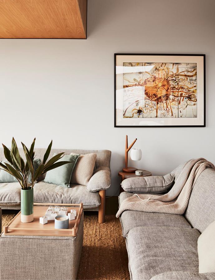 Leeroy sofas, and Tommy ottomans, all Grazia & Co. Baby Tree table lamp, Pierre+Charlotte. Australian House & Garden vase, cushions and throw, all Myer. Rug, Halcyon Lake. Artwork by John Olsen