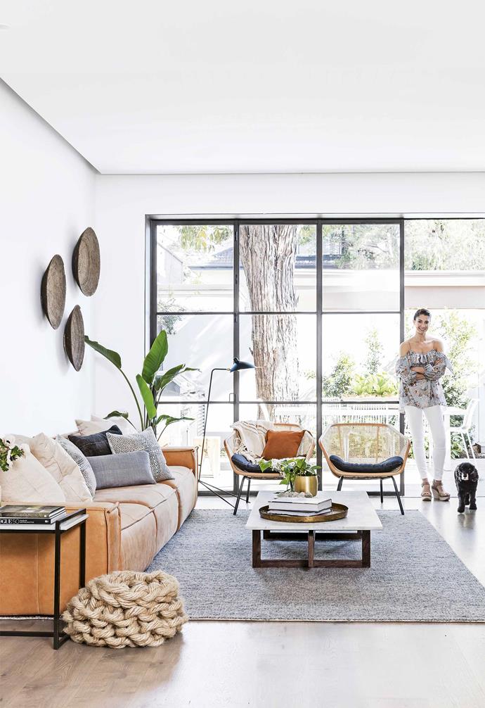 Wanting to create a seamless connection between the outdoor entertaining zone and the living room, black steel-framed doors were chosen to help connect the two spaces in this [renovated Federation cottage](https://www.homestolove.com.au/federation-cottage-queens-park-18311|target="_blank"). The steel-framed windows fold as needed, allowing the two spaces to become one.