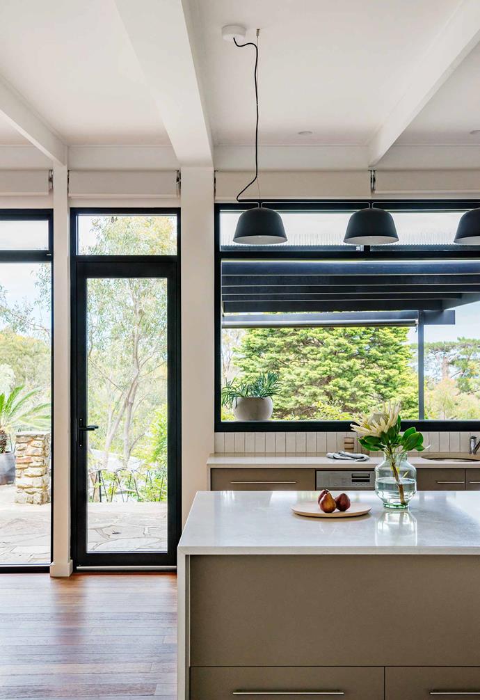 This [mid-century modern stone cottage in Adelaide](https://www.homestolove.com.au/mid-century-modern-home-adelaide-hills-21553|target="_blank") was given a contemporary update to make it more suitable for modern living which included the addition of double-glazed windows and doors framed in black.