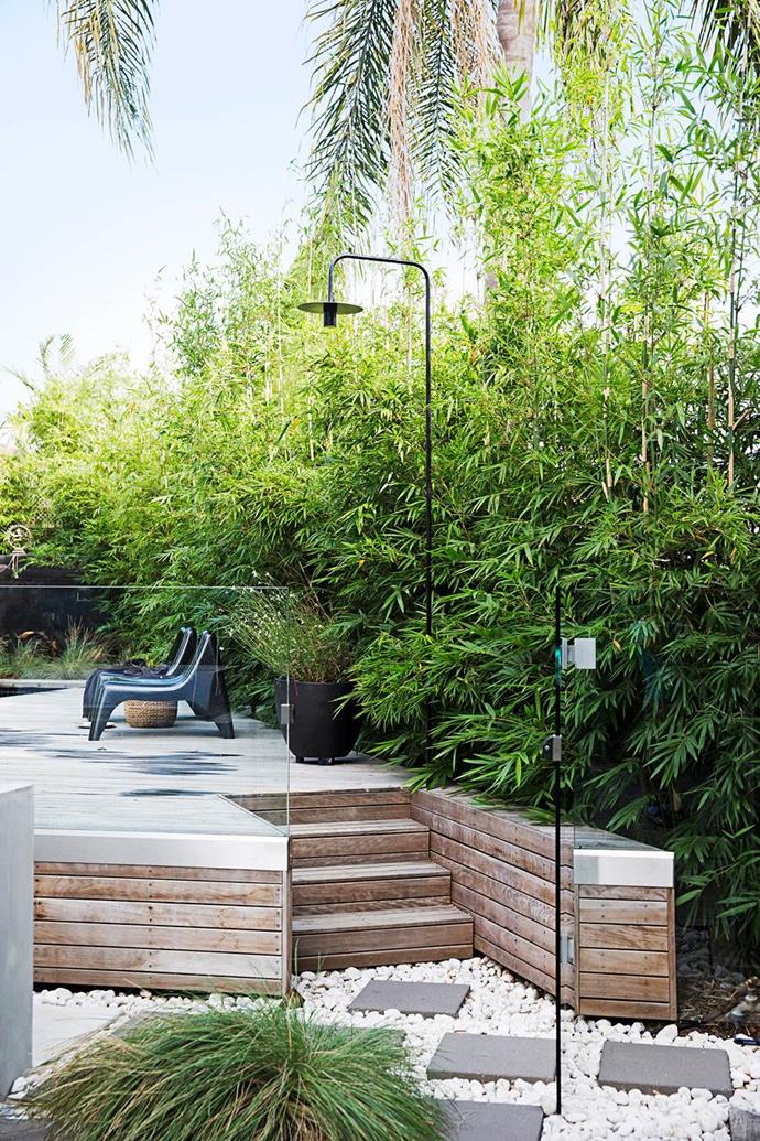 Traditional recycled hardwood shiplapped was used to clad this [Swiss-style home](https://www.homestolove.com.au/gallery-swiss-style-house-extension-in-sydneys-inner-west-2001|target="_blank") and the outdoor shower and pool area. Photo: Chris Warnes | Story: Real Living