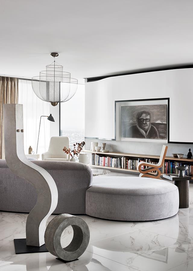Alicia Holgar deployed shapely curves within this [Brisbane apartment](https://www.homestolove.com.au/luxurious-apartment-filled-with-art-20492|target="_blank"), channelling the lines of the Harry Seidler-designed building for its cocooning, art-filled core.