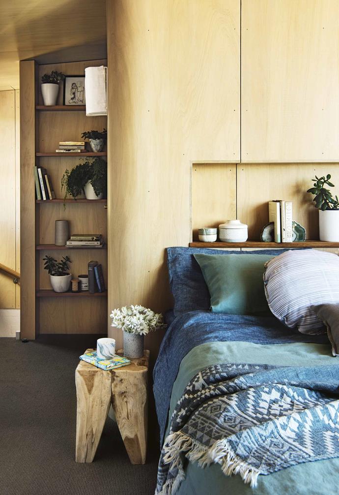 In the bedroom of this [dreamy beachside home](https://www.homestolove.com.au/how-to-bring-coastal-textures-into-the-home-18270|target="_blank"), a mix of playful cushions effortlessly tie in coastal cues to the bedroom.