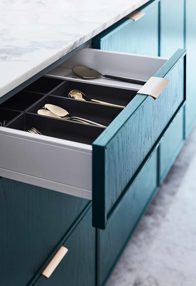 **Storage** There's no such thing as too much storage, so the kitchen island is also filled to the brim with storage space.