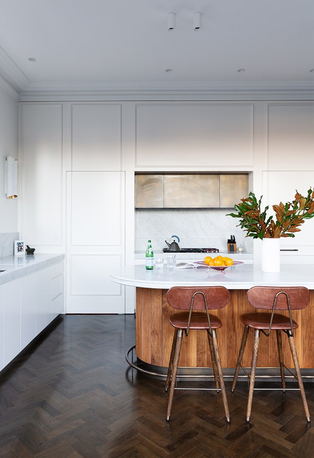 Choosing the right kitchen bar stool can lock in your decorating style. The American oak and leather with brass detailing work perfectly with [this kitchen scheme](https://www.homestolove.com.au/heritage-family-home-sydney-21847|target="_blank"). 