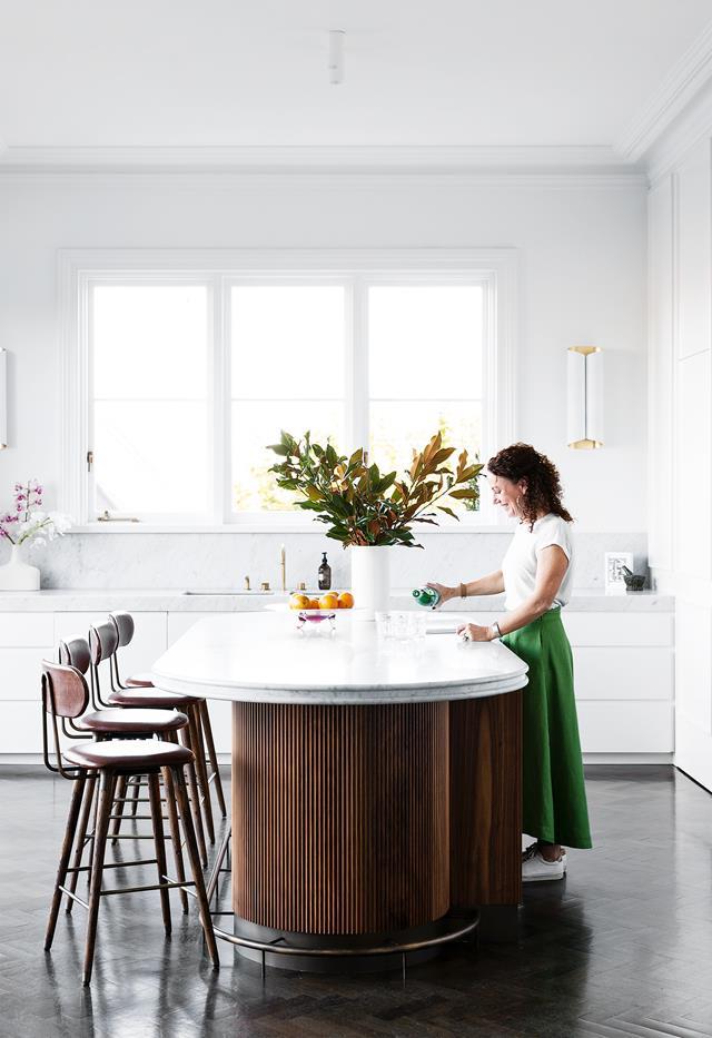 "It sounds simple, but finding a stool that didn't overwhelm the bench was difficult," said the owner of this [heritage Sydney home](https://www.homestolove.com.au/heritage-family-home-sydney-21847|target="_blank"). After a long search, they found the 'Broom' stool at Contempo and Co. The American oak and leather with brass detailing work perfectly with the timber panelled kitchen island and met the brief for hard-wearing elegance.