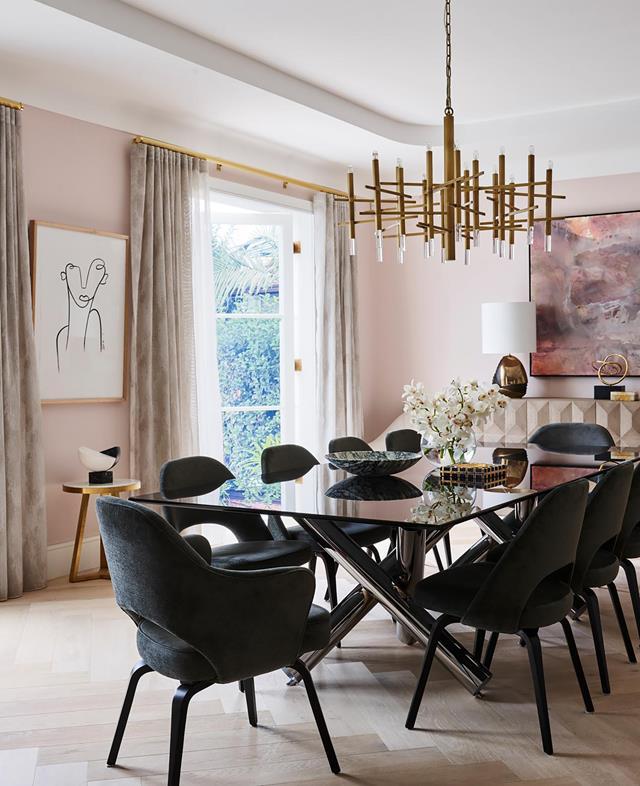 A youthful romance with pink and grey informed the subtle palette for this [sophisticated home](https://www.homestolove.com.au/sophisticated-yet-youthful-art-deco-home-21152|target="_blank") conceived by Greg Natale. The glamorous grand dining room features Minotti 'Van Dyck' dining table and Knoll 'Saarinen' chairs, all from De De Ce.