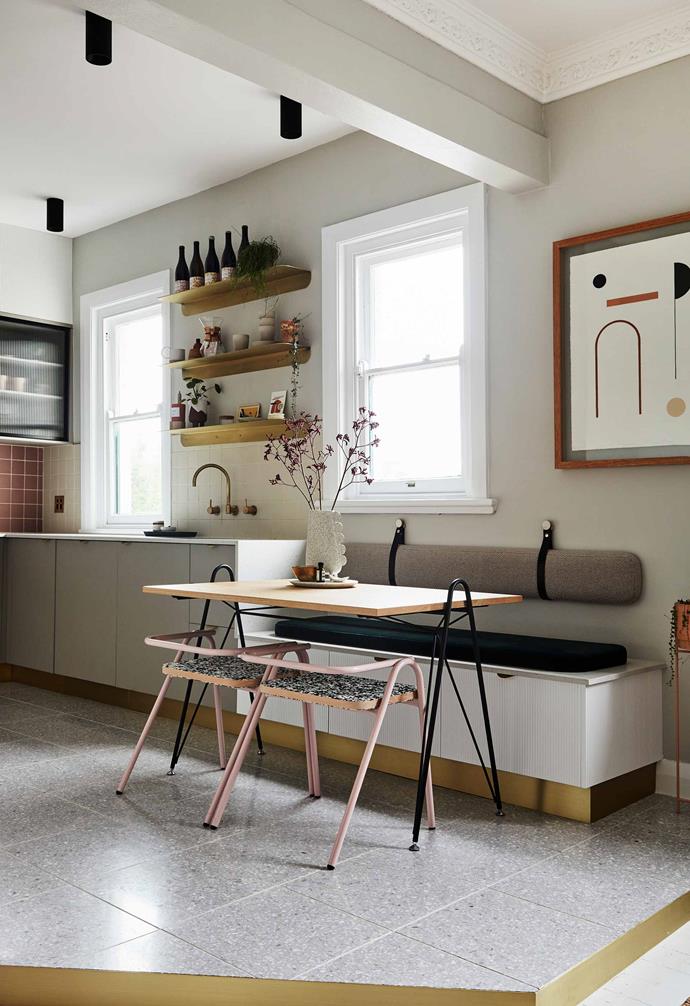 A clever dining nook was created to the side of the kitchen in this [interior designer's compact apartment](https://www.homestolove.com.au/small-apartment-design-ideas-20593|target="_blank"), courtesy of a chic banquette seat that includes storage space.