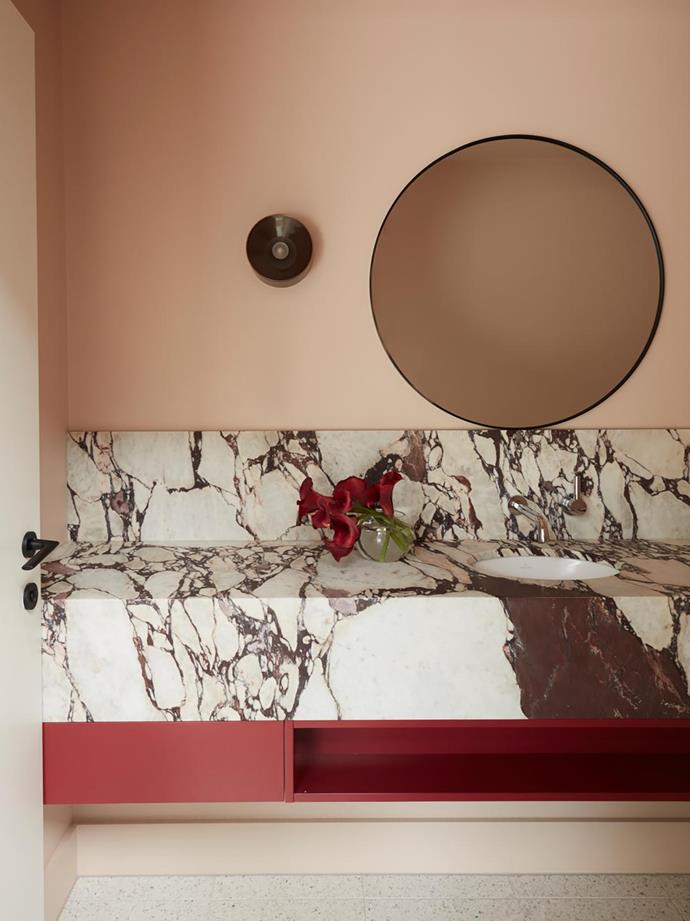 Joinery designed by Siobhann Studio. Calacatta Viola benchtop, CDK Stone. Walls painted Resene Just Right. Vanity painted Porter's Paints Dragon's Eye. Mirror, Kmart. Anton wall light, Volker Haug. Brodware 'City Plus' tapware, Candana.