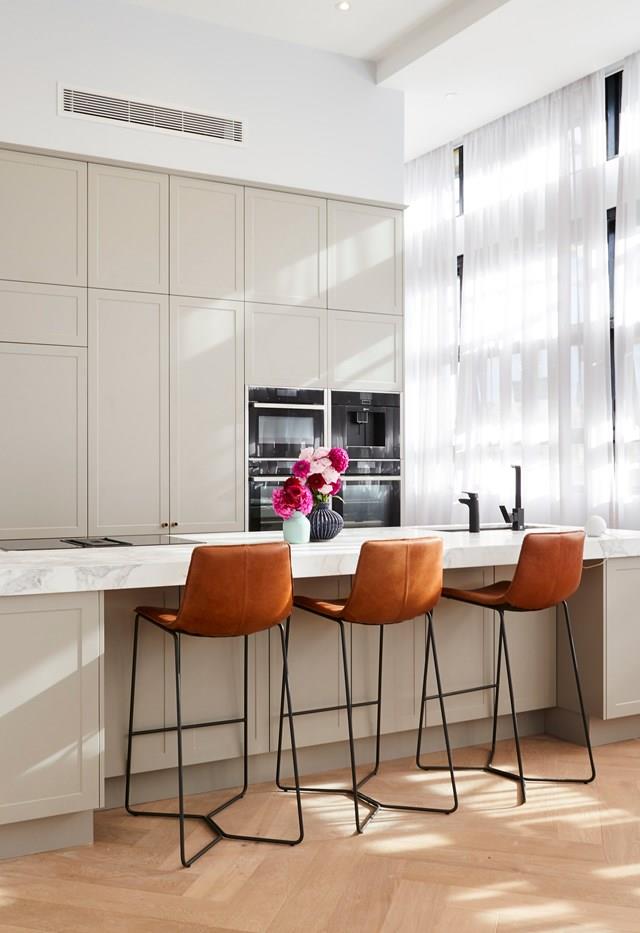 Jess and Norm's stunning kitchen. The judges were enamoured with the thick marble bench and the Shaker-style cabinetry in the duo's elegant kitchen