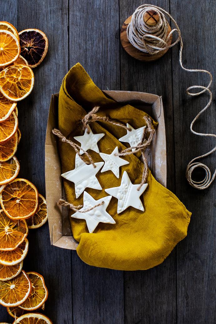 "Dehydrated oranges make a beautiful golden garland that is very simple to make and plastic free," says stylist Kara Rosenlund.