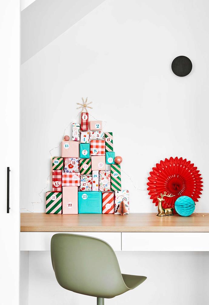 **Study** A homemade advent calendar made from [Cotton On](https://cottonon.com/AU/|target="_blank"|rel="nofollow") wrapping sits amid paper decorations from [Poppies For Grace](https://poppiesforgrace.com/|target="_blank"|rel="nofollow"). Desk chair, [Muuto](https://muuto.com/|target="_blank"|rel="nofollow").