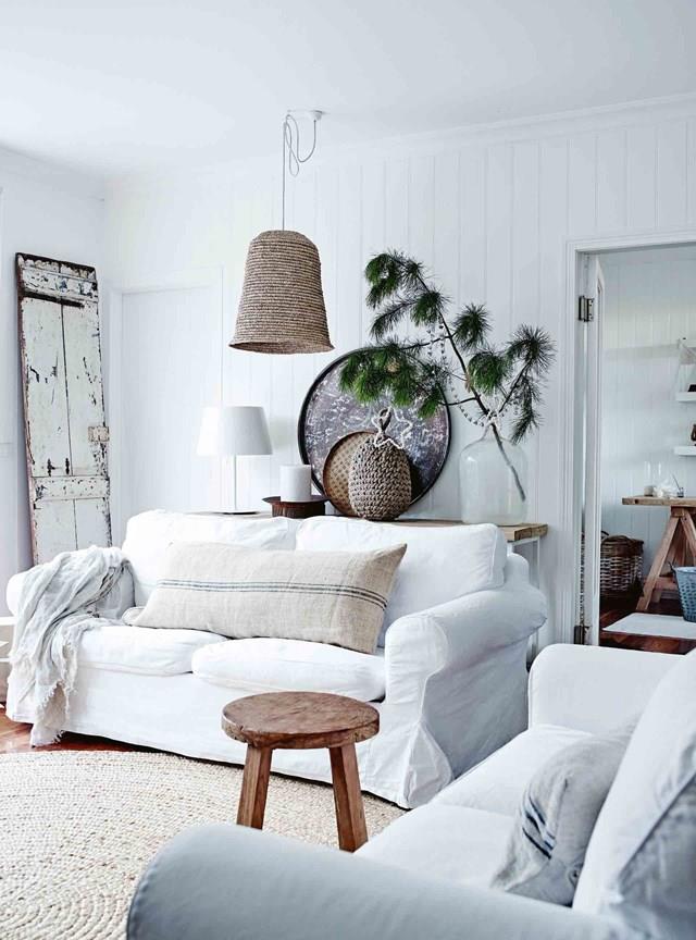 Simple, organic styling and DIY Christmas tree branch made from foraged finds, and only a select few [baubles and decorations](https://www.homestolove.com.au/how-to-decorate-a-christmas-tree-4348|target="_blank") is in keeping with this home's natural, coastal vibe.