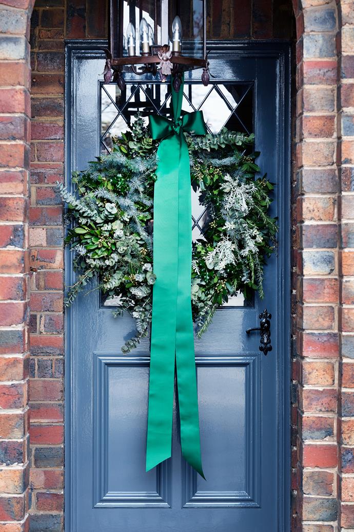 "I hang a wreath on the front door every year; that's my announcement to the world that we're a family of Christmas lovers!" says avid entertainer [Chyka Keebaugh on decorating her family home from top to bottom for the festive season](https://www.homestolove.com.au/stylish-christmas-decorating-6121|target="_blank"). The silver dollar gum wreath with its statement satin bow makes a bold first impression.