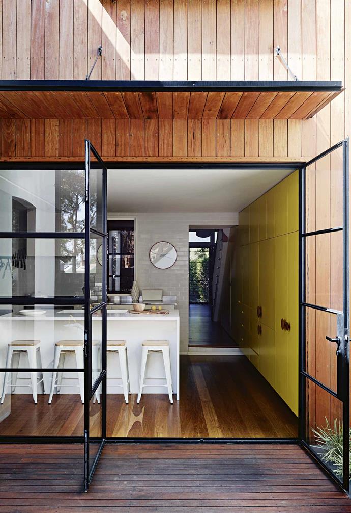 As part of their extensive renovation, a kitchen with yellow cabinetry was a must for this transformed [light-filled terrace](https://www.homestolove.com.au/terrace-renovation-newtown-17820|target="_blank"). The bright and happy colour has transformed the kitchen into a central feature for the home.