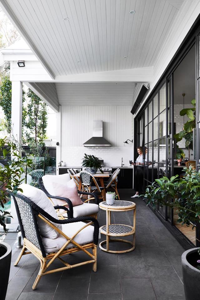 Not everyone gets a second bite of the cherry when it comes to renovating, but Terri Shannon did: she's had the good fortune to have renovated her [bayside Melbourne home](https://www.homestolove.com.au/renovated-white-weatherboard-home-melbourne-21530|target="_blank") twice now, with the most recent project seeing an open-plan extension added. The outdoor area is perfect for entertaining with it's outdoor kitchen, dining area and casual seating zone.