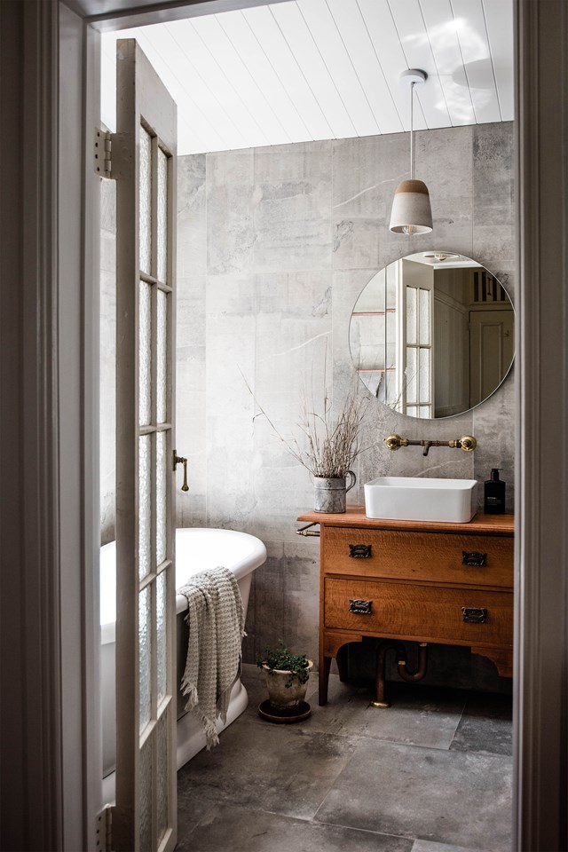 The owner of [this renovated cottage](https://www.homestolove.com.au/coastal-country-cottage-22120|target="_blank") salvaged an antique silkyoak cabinet for the bathroom vanity. *Photo: Hannah Puechmarin / Styling: Cheryl Carr / Story: Country Style*