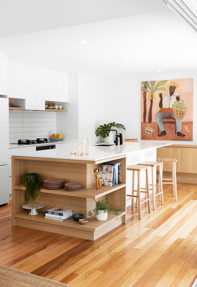 Polytec 'Legato' cabinetry in Crisp White is a subtle backdrop to an island bench topped in Quantum Quartz 'Michelangelo' in [this light-filled kitchen](https://www.homestolove.com.au/coastal-home-northern-nsw-22199|target="_blank").
